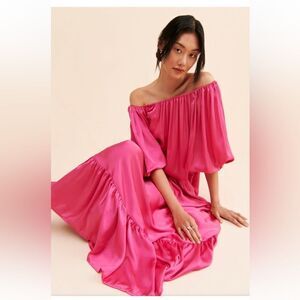 Bettina Maxi Dress
Erika Pena for Anthropologie Penmark on the left sleeve